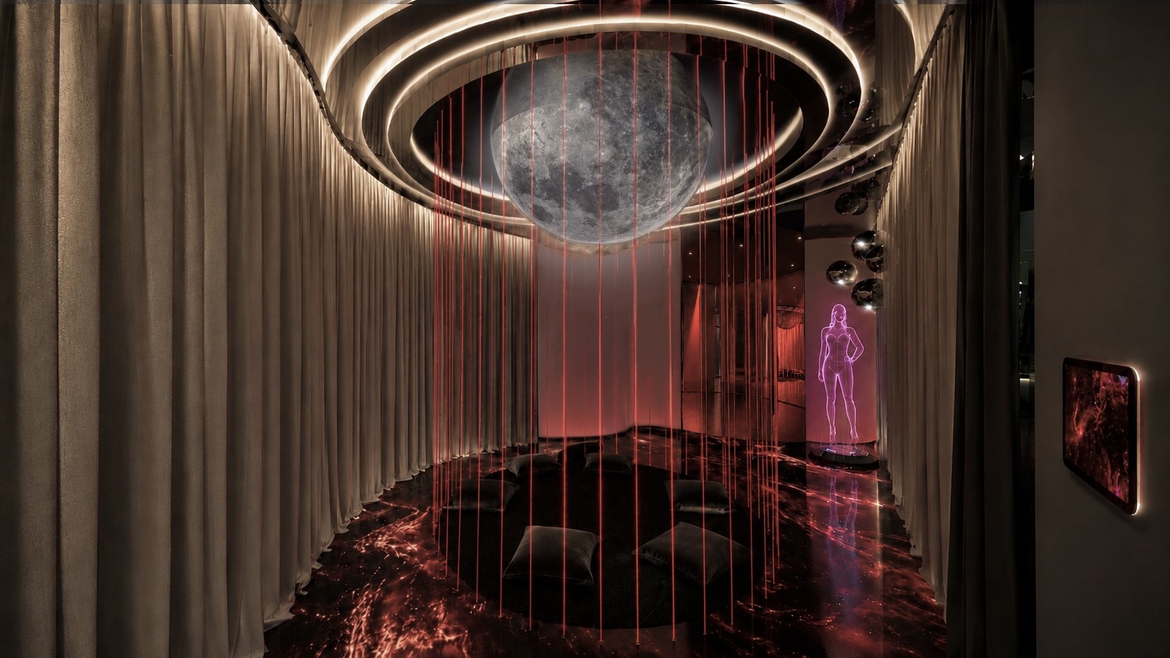 Ritual zone with suspended moon and red light threads